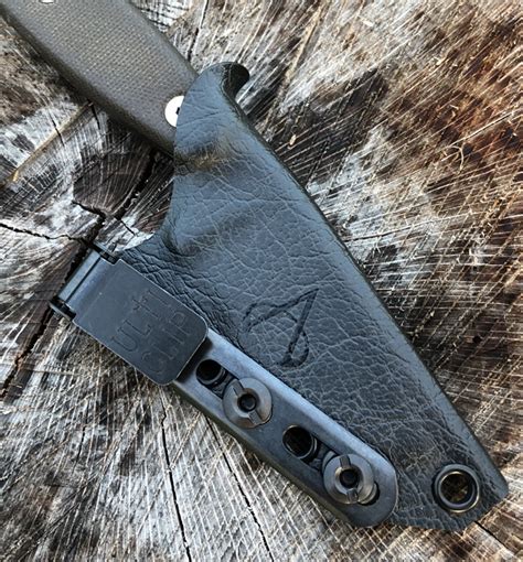 All the necessary mounting screws and spacers are included. . Knife sheath hardware